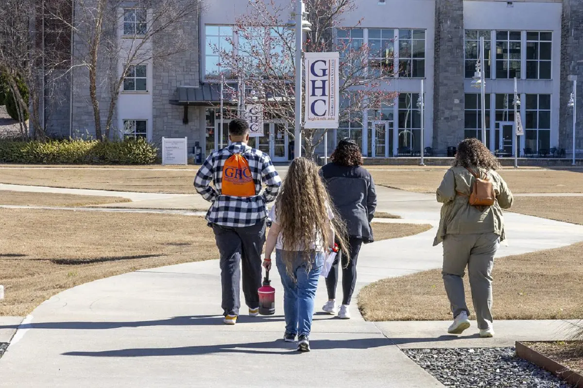 Students walking towards building